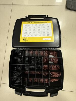 Kit di riparazione guarnizioni per escavatore con scatola portaoggetti separata con griglia e tabella delle dimensioni stampata per un facile accesso e una ridotta inattività della macchina